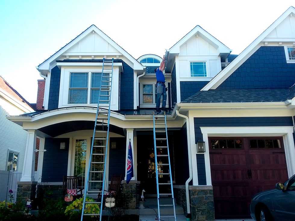 Before and after power washing on vinyl siding